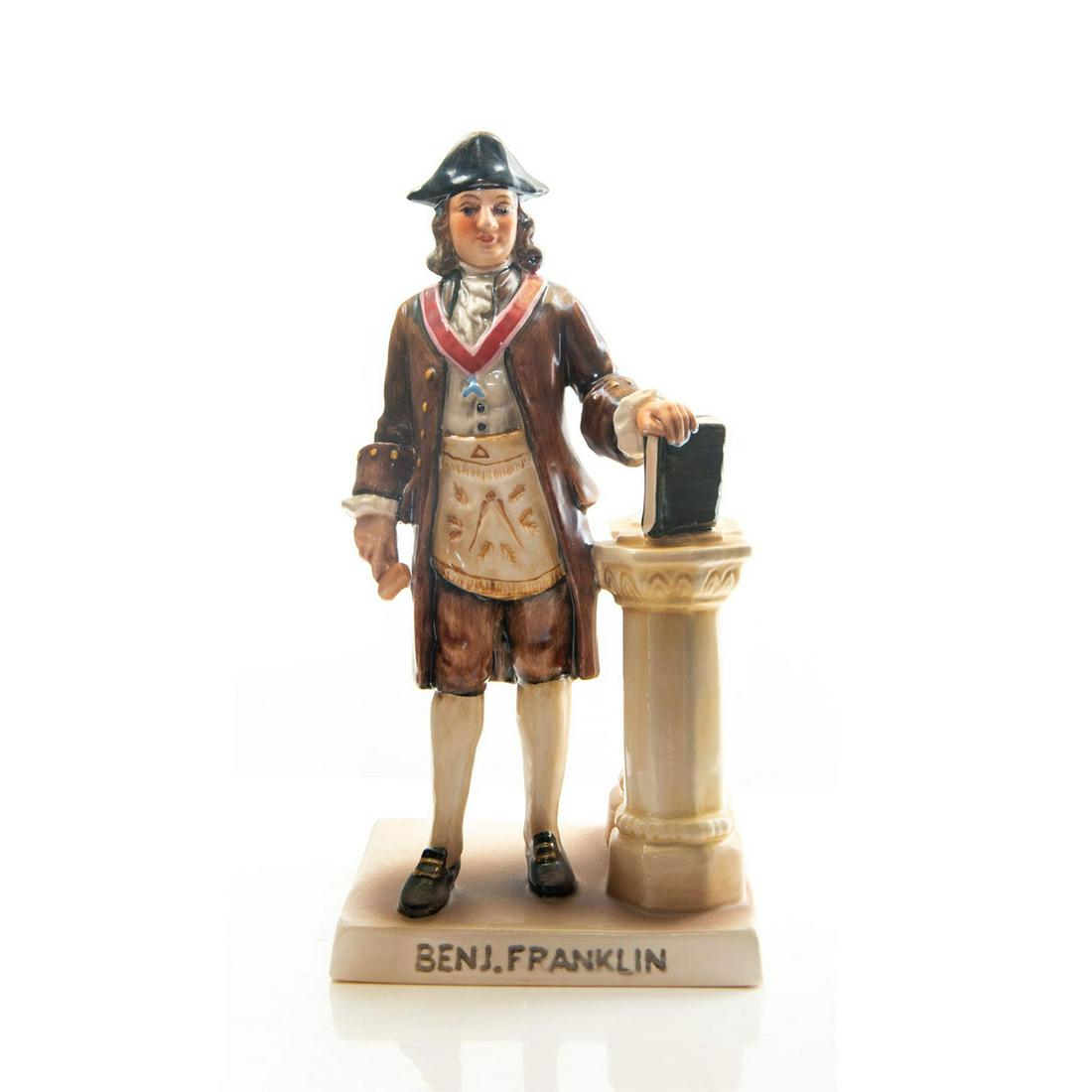 GOEBEL FIGURINE, BENJAMIN FRANKLIN, 1957: Ceramic model; Ben wearing Masonic apron. Goebel backstamp. Artist: Issued: c. 1957 Dimensions: 8"H Manufacturer: Goebel Country of Origin: Germany