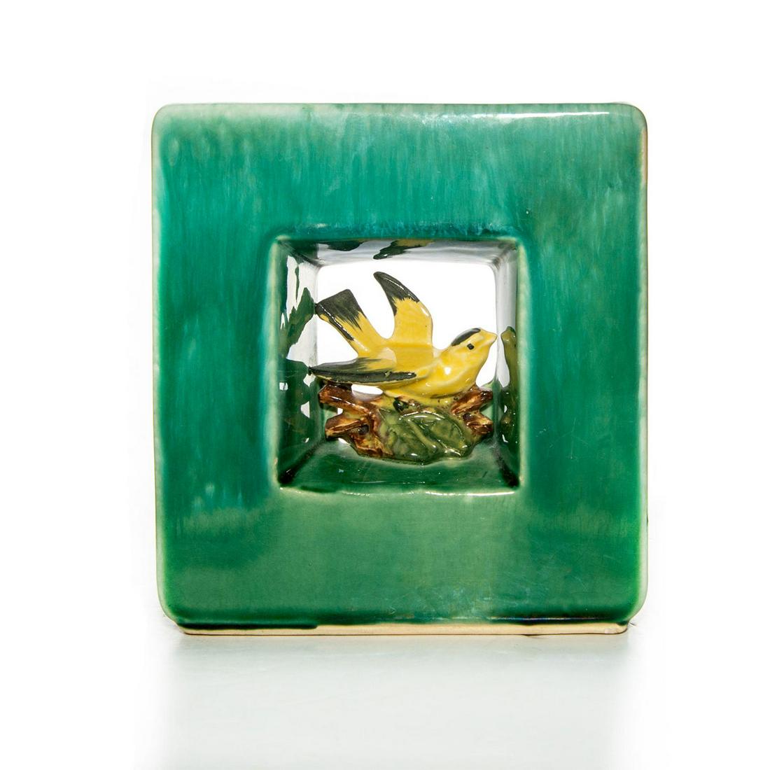 MCCOY MID CENTURY VASE WITH BIRD: Square double sided planter vase with yellow bird in the center. Small chip towards the bottom. Issued: 20th c. Dimensions: 6.75"H Country of Origin: United States
