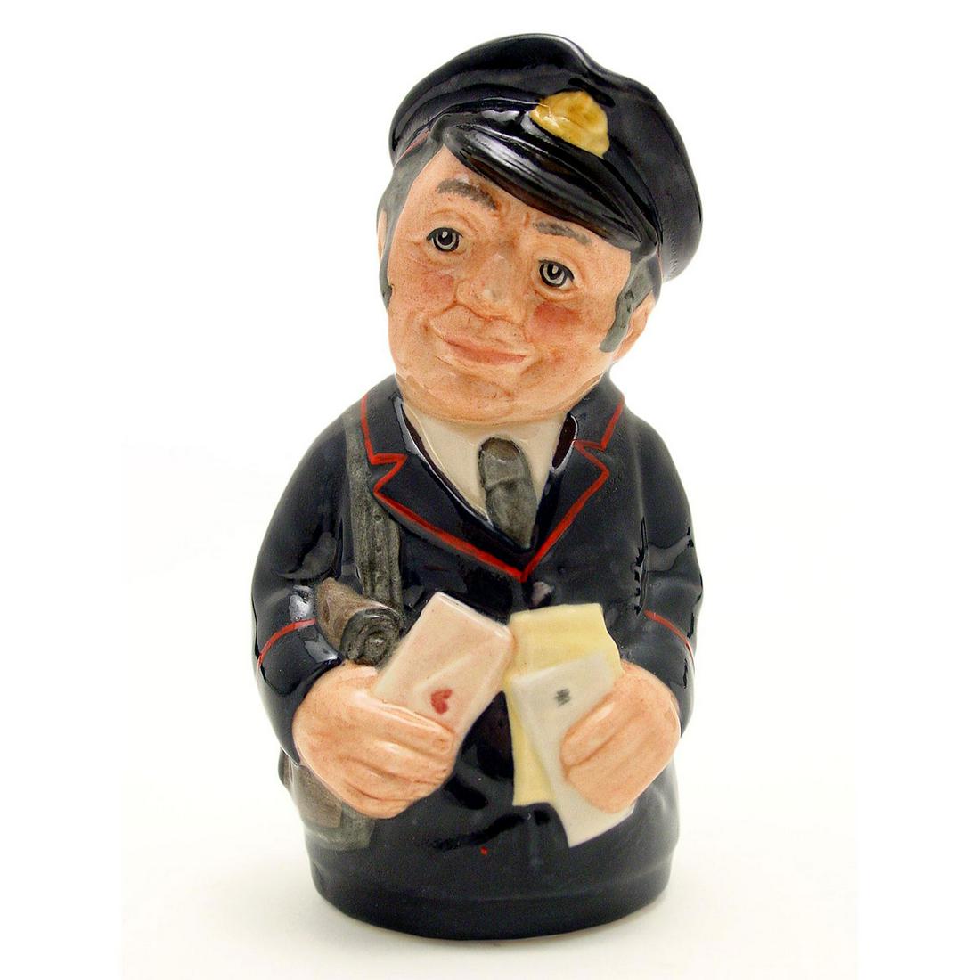 PAT PARCEL THE POSTMAN D6813 - ROYAL DOULTON TOBY JUG: Royal Doulton Toby Jug, Pat Parcel the Postman D6813 (dark blue uniform trimmed with red; grey postbag). Designed by William K. Harper. Series: The Doultonville Collection, issued 1989 - 1991. Size: 4