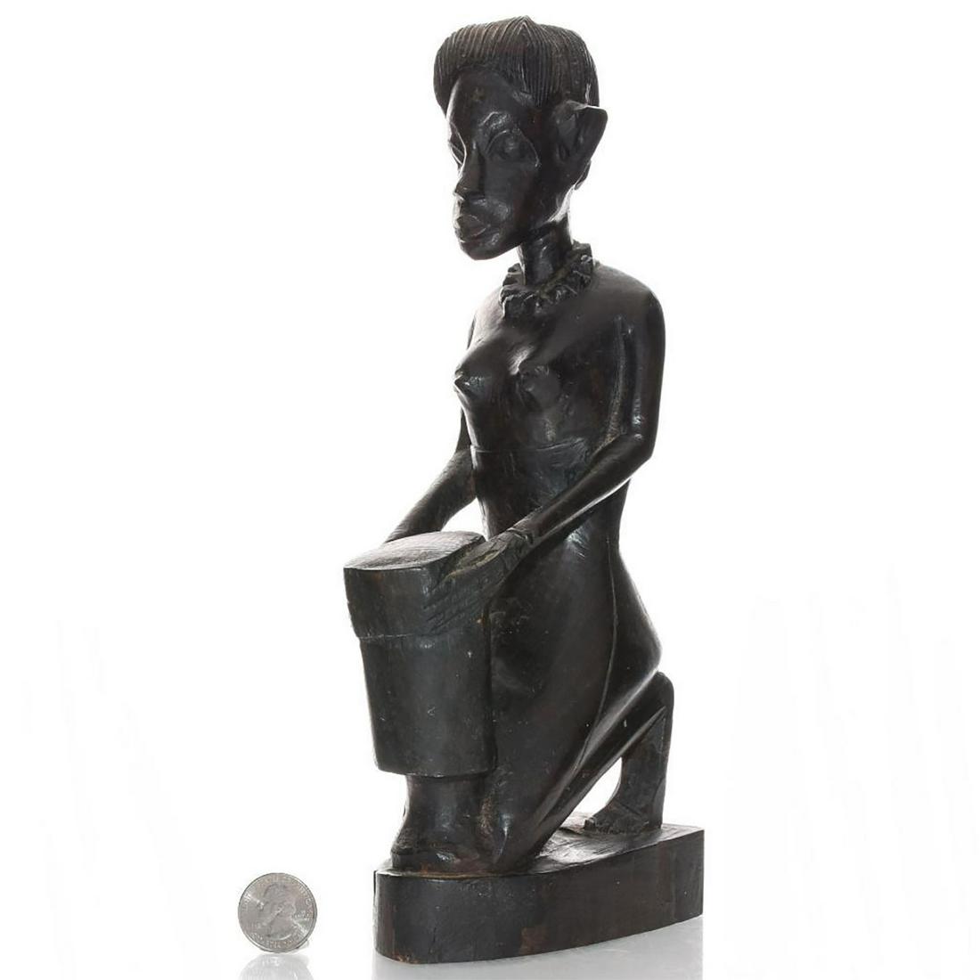 VINTAGE AFRICAN WOODEN WOMAN FIGURE: Traditional tribal figure; woman kneeling with basket or drum. Hand carved African folk art figure. Issued: 20th c. Dimensions: 11.5"H