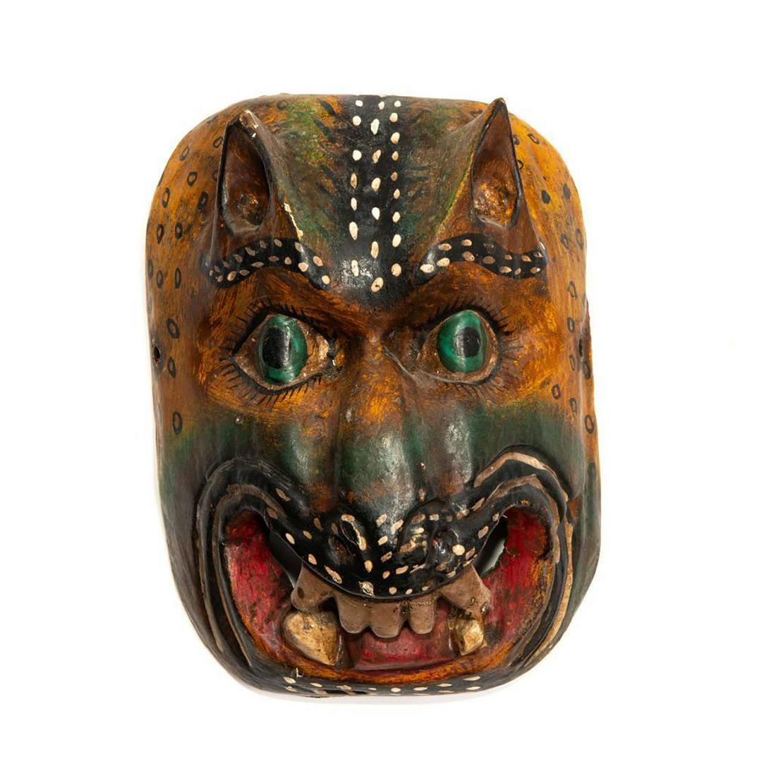 BALINESE ALLEGORICAL BARONG BHOMA TRIBAL WALL MASK: Hand made, decorated. Modeled as Far Eastern mythological spirit. This is a striking, hand made and decorated, allegorical Bhoma wall mask modeled as a Balinese Barong or mythological spirit of protec