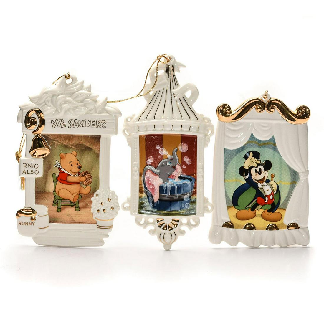THREE DISNEY CLASSICS HOLIDAY ORNAMENTS, 1995 TO 1997: DUMBO 1995, WINNIE THE POOH 1996, MAGICIAN MICKEY MOUSE 1997. Stamped to bases WALT DISNEY COLLECTORS SOCIETY ORNAMENT. Certificates of Authenticity. Collectors boxes. Dimensions: 4.75"H x 2.5"W, larg