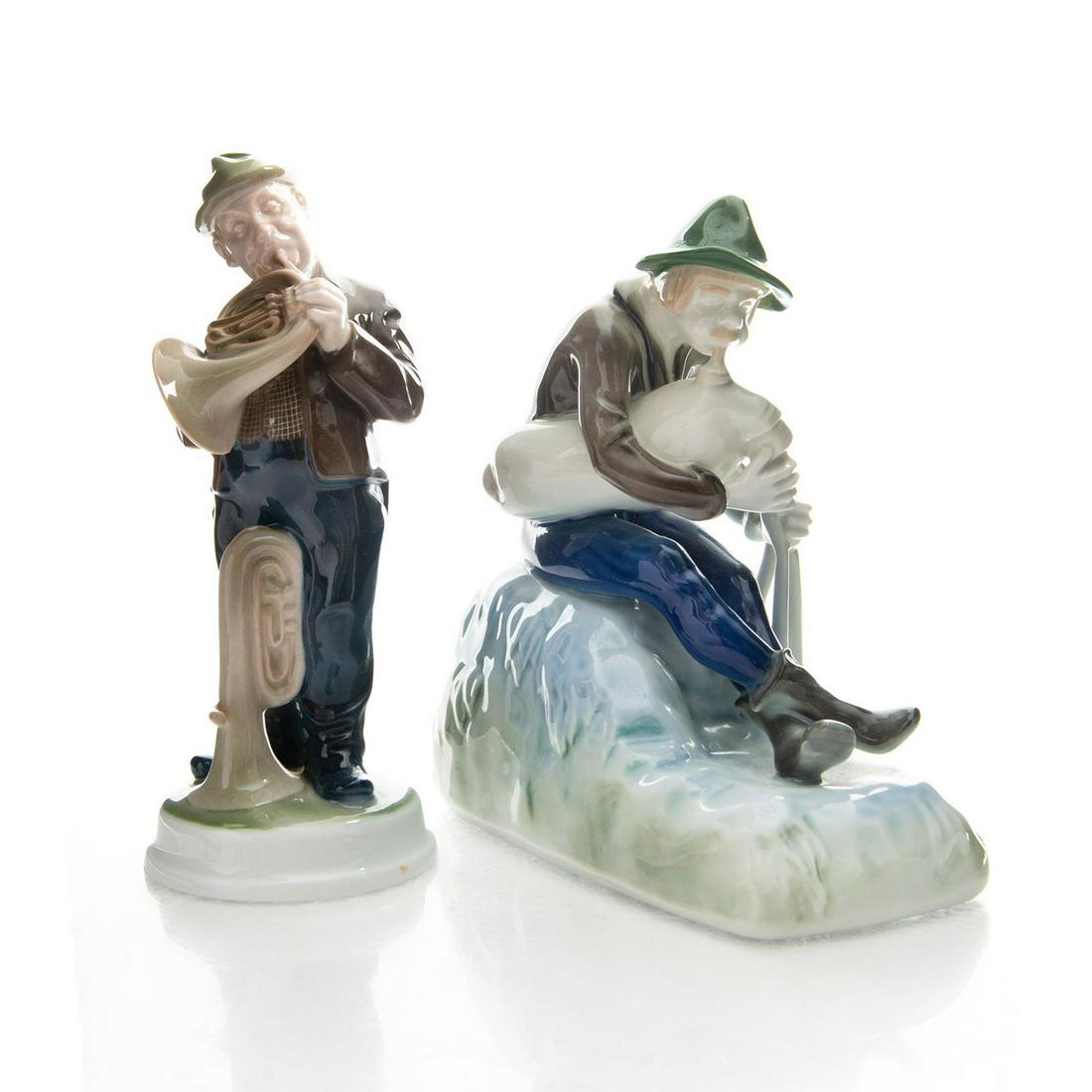 2 ROSENTHAL FIGURINES, MUSICIANS: Horn player and Bagpiper finished with glossed glaze. Horn player is designed by Karl Himmelstoss and Bagpiper is designed by Michel Beyrer. Both figurines with artists signature to base and marked to