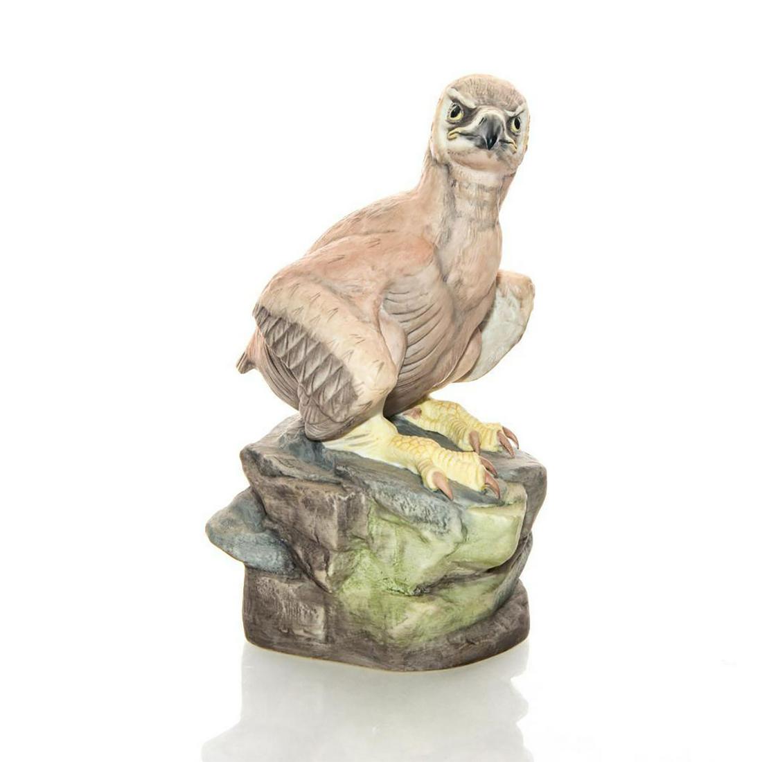 VINTAGE BOEHM BIRD FIGURE, YOUNG AMERICAN BALD EAGLE: Ltd. Ed. handpainted porcelain eagle figure. Stamped to base. Sculptural piece from the E. M. Boehm Studios, 1950. Edward Marshall Boehm was an American figurative expressionist sculptor known for his