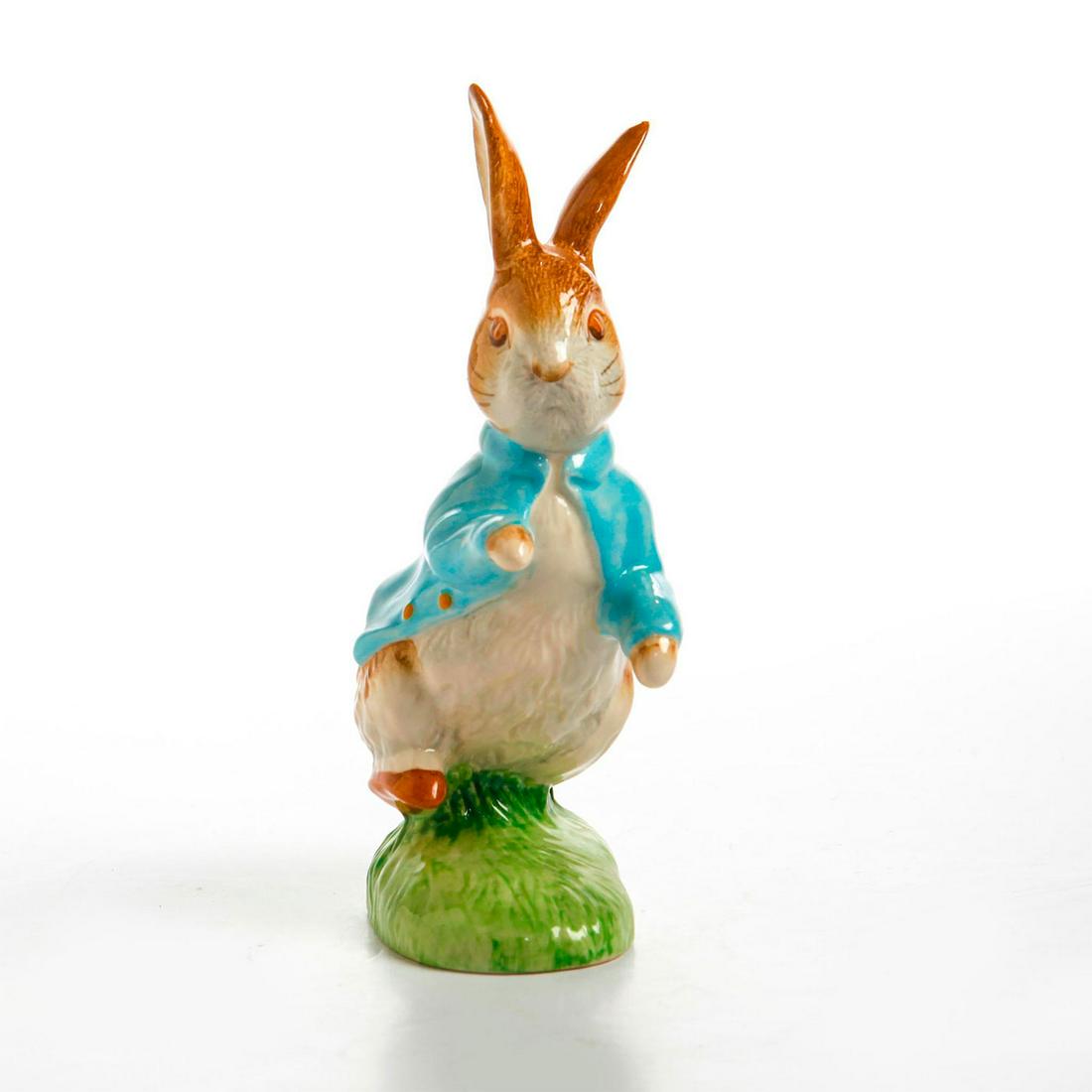 BESWICK POTTERY FIGURINE, PETER RABBIT: Beatrix Potter character. Blue and white colorway. Beswick backstamp.Artist: Issued: 20th c. Dimensions: 7"H Manufacturer: Beswick Country of Origin: England