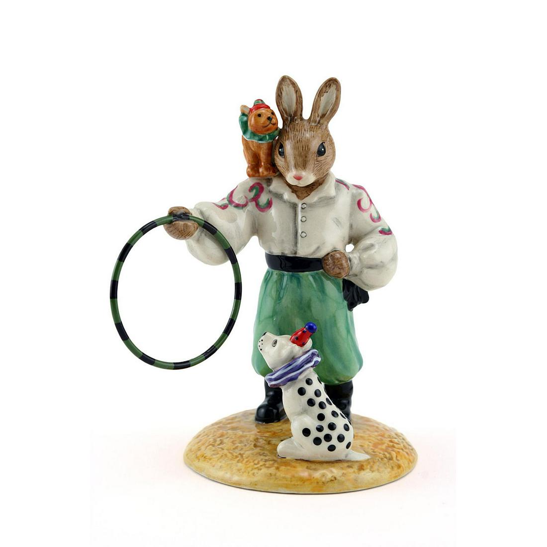 TINO THE TRIXSTAR DB333 - ROYAL DOULTON BUNNYKINS: Royal Doulton Bunnykins, Tino the Trixstar Bunnykins DB333 (white shirt with pink trim, green pants, black sash and boots, white and black spotted dog). Issued 2005 - 2005. Size 4.75"H Issued: 2005 -