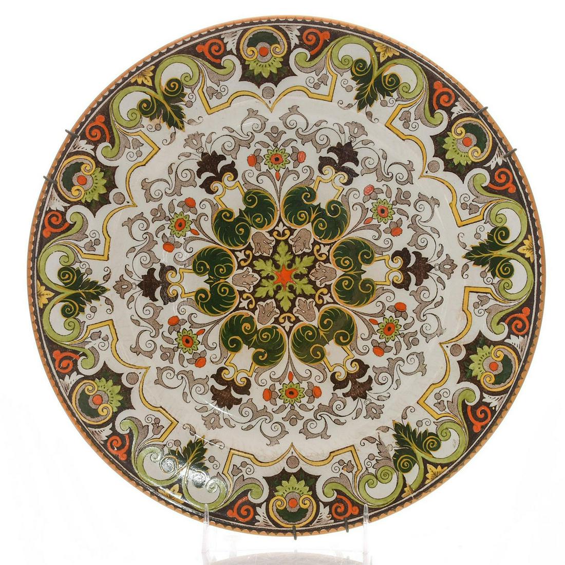 WEDGWOOD ROUEN PLATE: Decorative plate with green, orange and yellow design. Rouen design on front and Wedgwood stamp on back. Dimensions: 10.5"D Manufacturer: Wedgwood Country of Origin: England