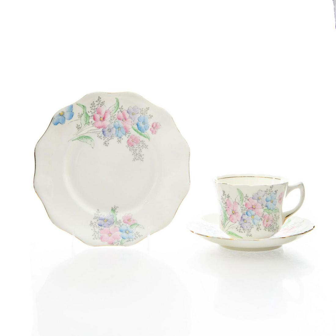 3 PC. FOLEY CHINA TEA CUP AND SAUCER SET: Ceramic trio. Teacup, saucer and plate. Floral design; gilt rim. Foley China backstamp. Issued: 20th c. Dimensions: 7.25"D, largest Manufacturer: Foley China Country of Origin: England