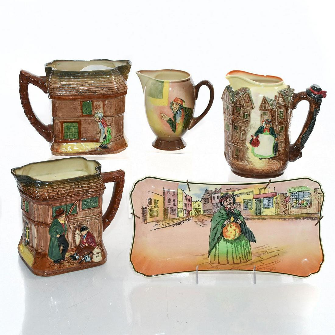ROYAL DOULTON DICKENS GROUP, 4 PITCHER JUGS AND PLAQUE: Scenes from Oliver Twist, Old Curiosity Shop, Martin Chuzzlewit. A group of five early 20th century Royal Doulton ceramics, commemorating characters from Charles Dickens. A water or whisky pitcher wit