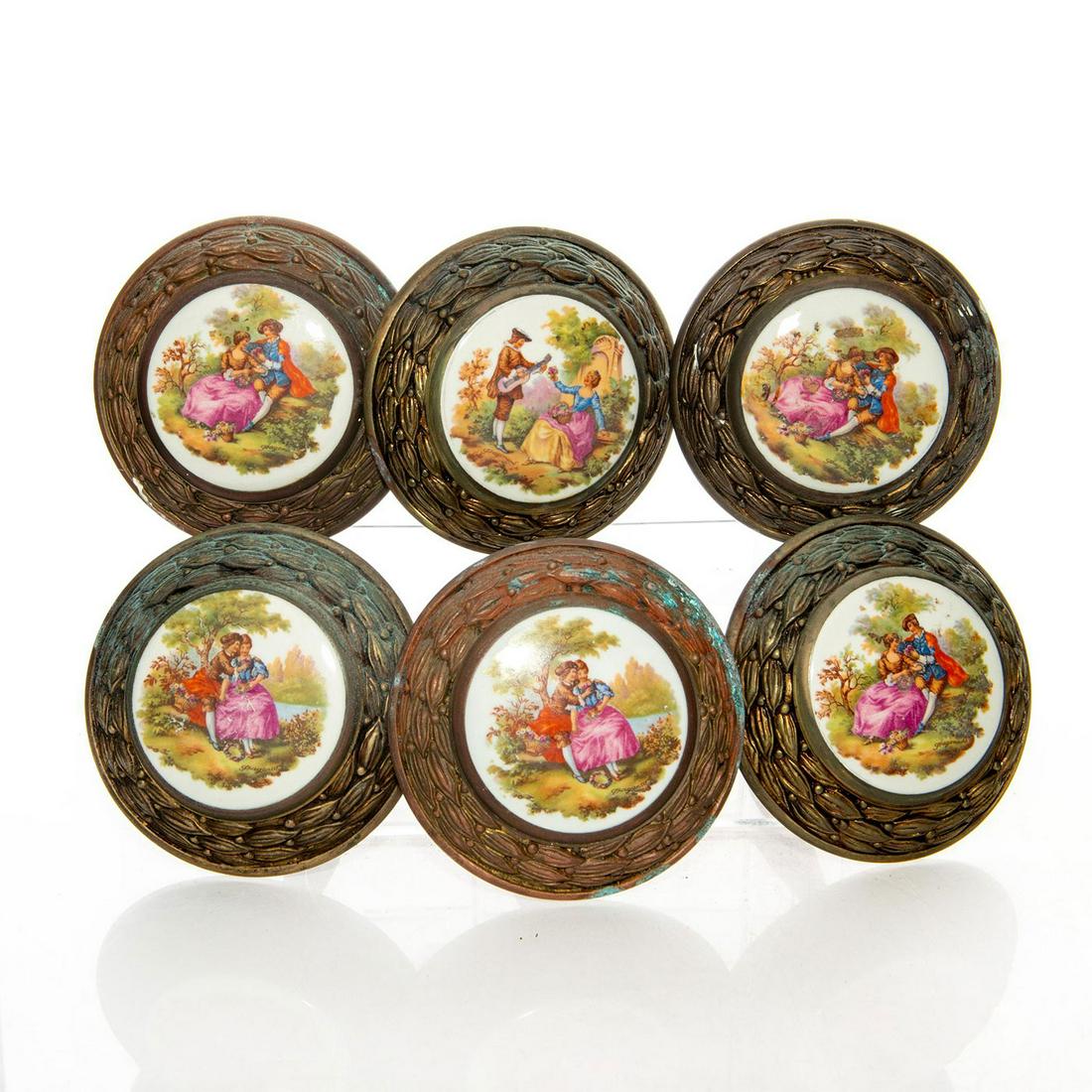 6 BRONZE AND FRAGONARD PORCELAIN CURTAIN TIEBACKS: Porcelain depicts romantic scenes. Each signed Fragonard. Heavy patina to bronze. Issued: Early - Mid 20th c. Dimensions: 4.5"C x 5.5"L