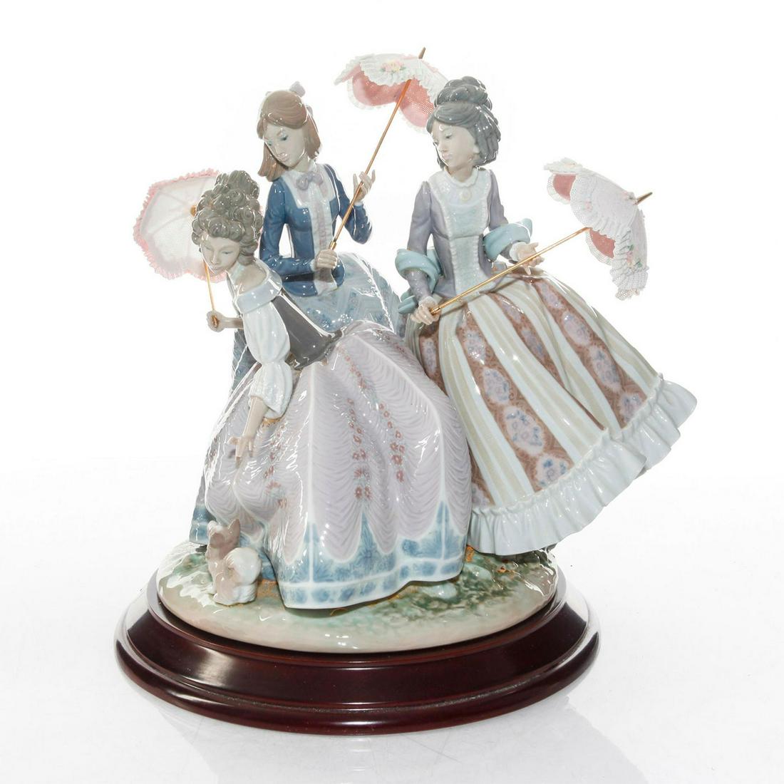LARGE LLADRO FIGURAL GROUP, THREE SISTERS 01001492: 3 sisters holding parasols. Limited edition 931 of 3000. W. base. Porcelain; high gloss finish. Tres Hermanitas. Lladro backstamp. Artist: Jose Puche Issued: 1986 Dimensions: 13.75"H Manufacturer: Lla