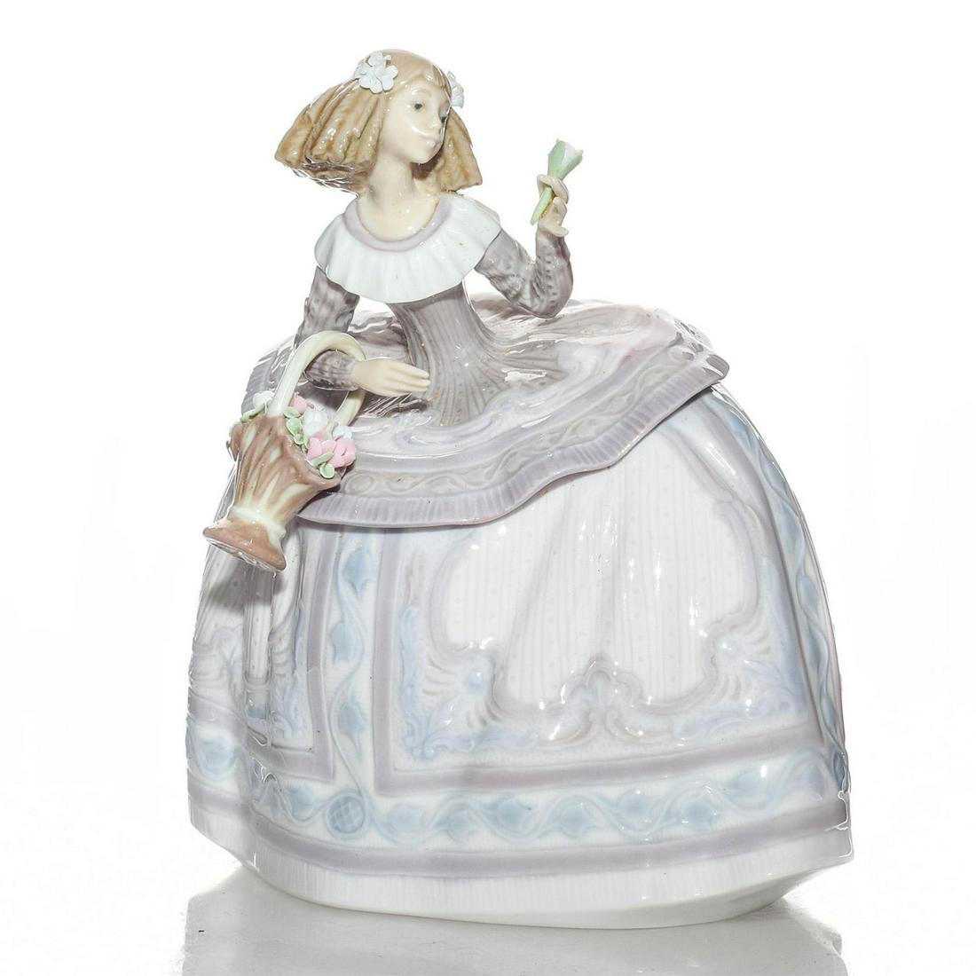 LLADRO LADY FIGURINE, TERESA 01005411: Depicts young woman holding basket of flowers. Porcelain; glazed. Exquisite details to delicate floral arrangement. Includes box; wear to box. Artist: Jose Puche Issued: 1987-1989 Dimensions: 6"H Manu