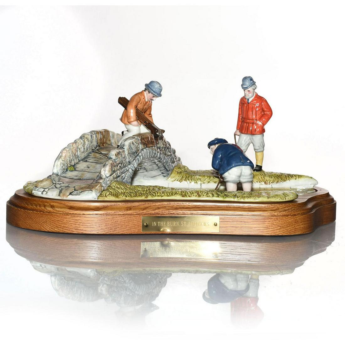 ROYAL DOULTON FIGURAL GROUP, IN THE BURN ST. ANDREWS: D6890. Limited edition 285 of 7500. From Doulton by Dai Studios. Doulton backstamp.Artist: William K. Harper Artist: William K. Harper Issued: 1990 Dimensions: 6"H x 13"L Manufacturer: Royal Doulton C