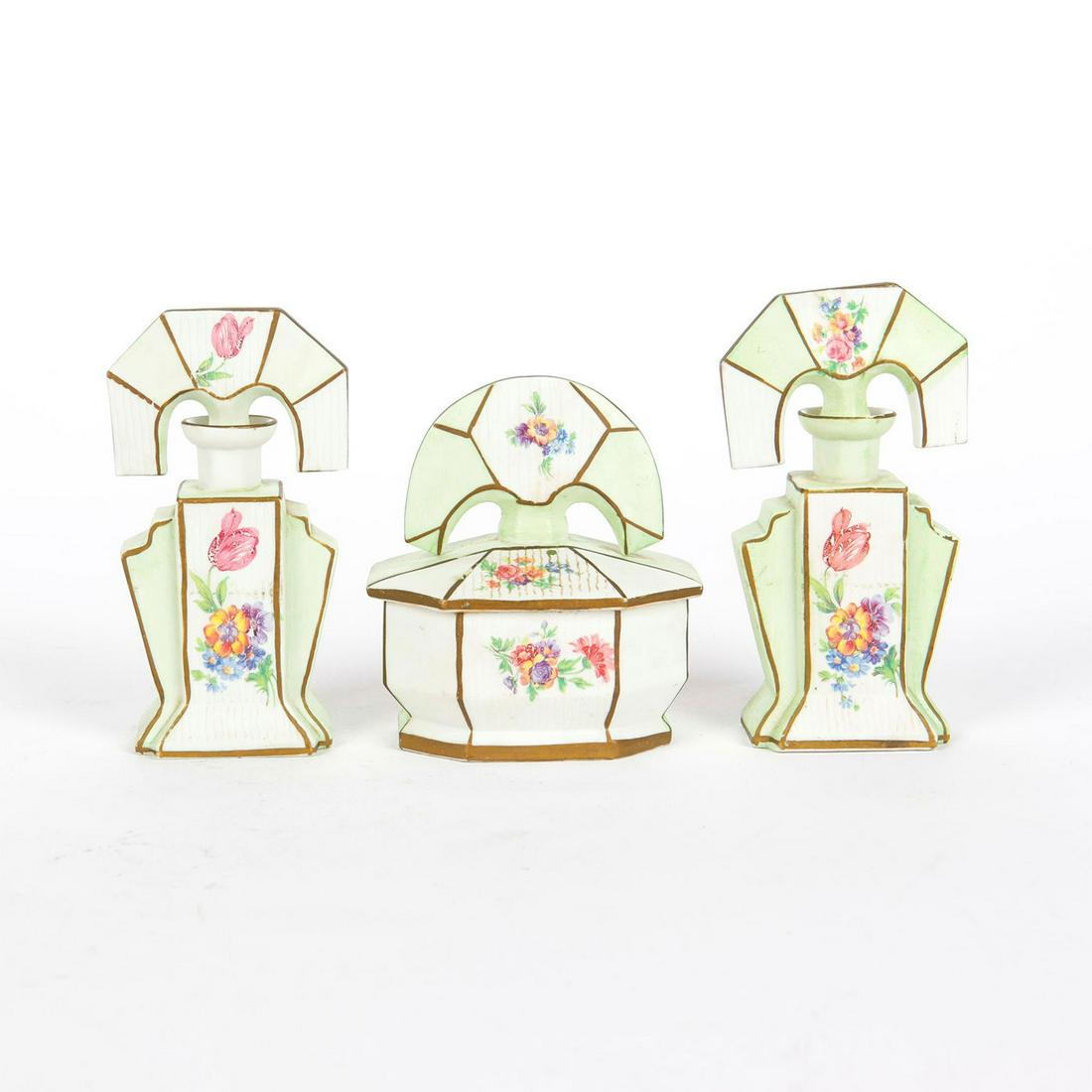2 CICO BAVARIAN CERAMIC PERFUME BOTTLES, 1 VANITY DISH: Rare, fine china set with hand painted floral design. Stamped Cico Bavaria Made in Germany to bottom. Issued: 20th c. Dimensions: 5.75"H, tallest Manufacturer: Cico Country of Origin: Germany