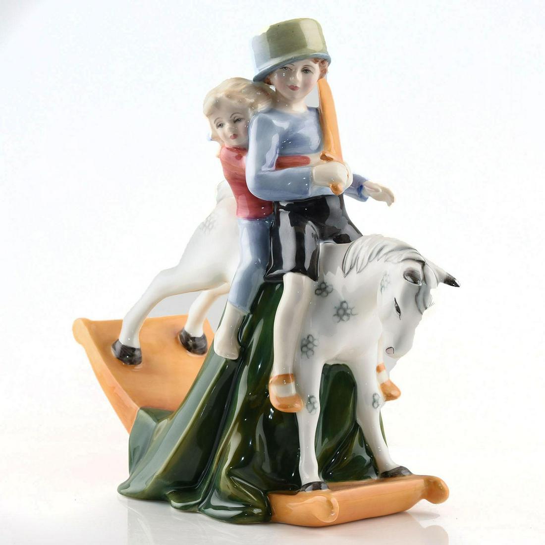 ROYAL DOULTON FIGURINE, HOLD TIGHT HN3298: Artist: Amanda Hughes Artist: Amanda Hughes Issued: 1990 - 1993 Dimensions: 8.5"H Manufacturer: Royal Doulton