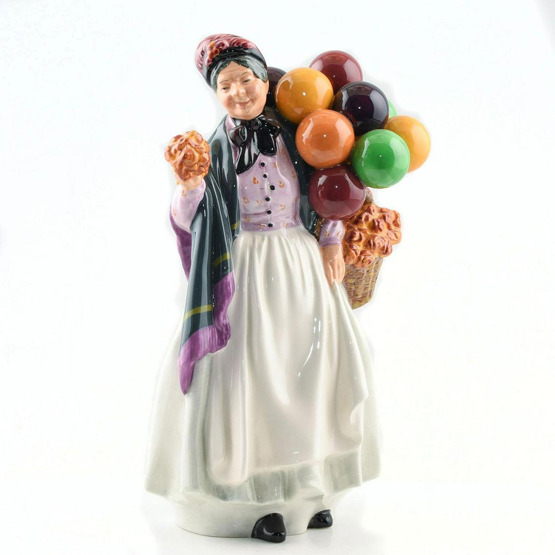ROYAL DOULTON FIGURINE, BIDDY PENNY FARTHING HN1843: Balloon Character Series. In a pink blouse with a delicate hand-painted pattern, simple white skirt and apron, a black scarf around her neck, and a black shawl with pink fringe draped over her shoulde