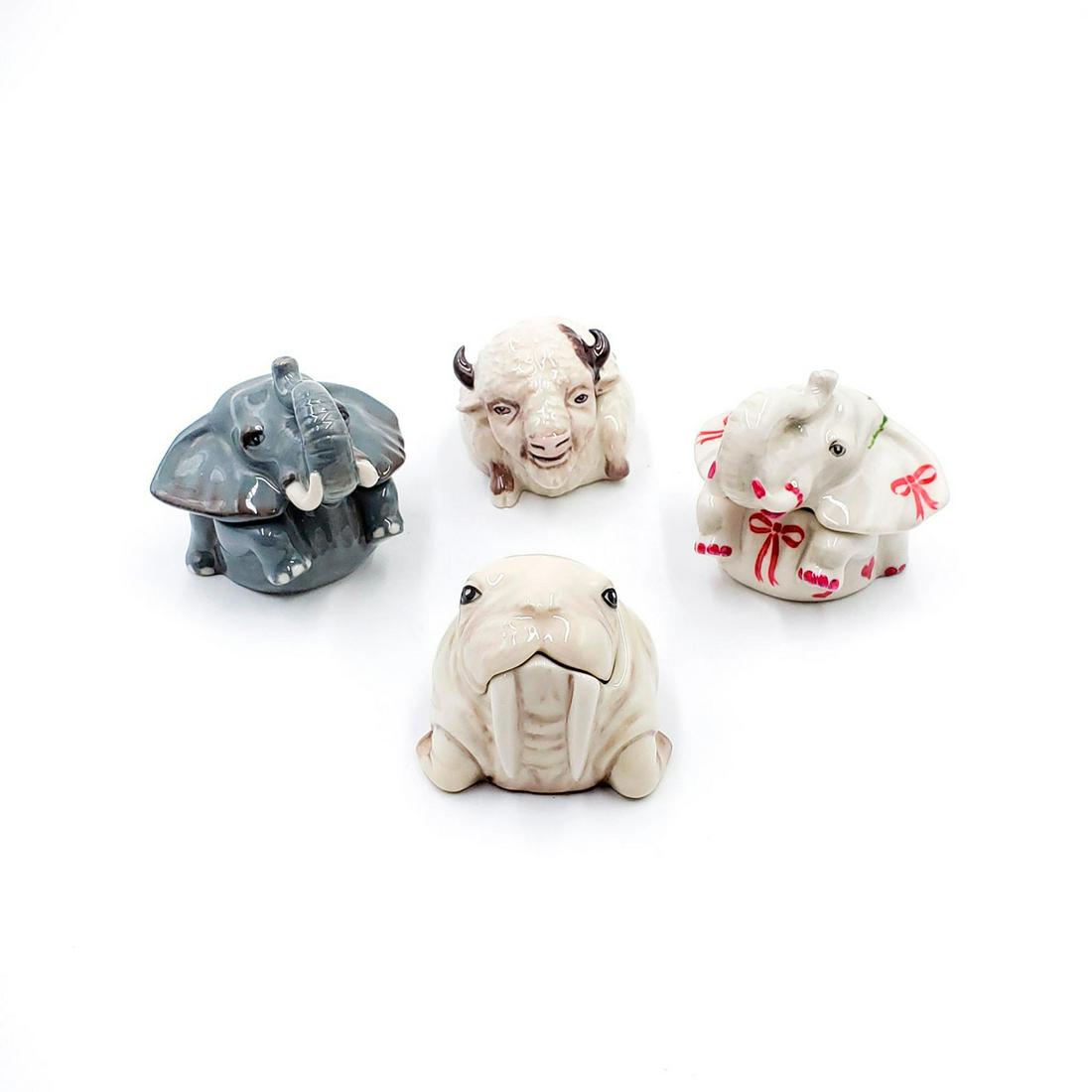 4 KEVIN FRANCIS FACE POTS, ANIMAL THEMED: Handmade and hand painted ceramics. Kevin Francis backstamp. Includes, Nellie the elephant, Love Nellie, Tantrica the white buffalo, John the walrus. Issued: 21st c. Dimensions: 2.75"H, tallest Manufa