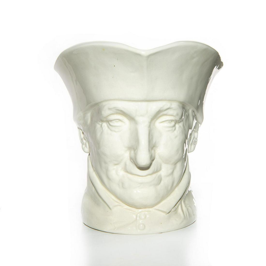 LG ROYAL DOULTON UNDECORATED CHARACTER JUG, CARDINAL: D5414. Tassel handle. Ceramic; white gloss. Doulton backstamp. Artist: Charles Noke Issued: 1936 Dimensions: 6.5"H Manufacturer: Royal Doulton Country of Origin: England