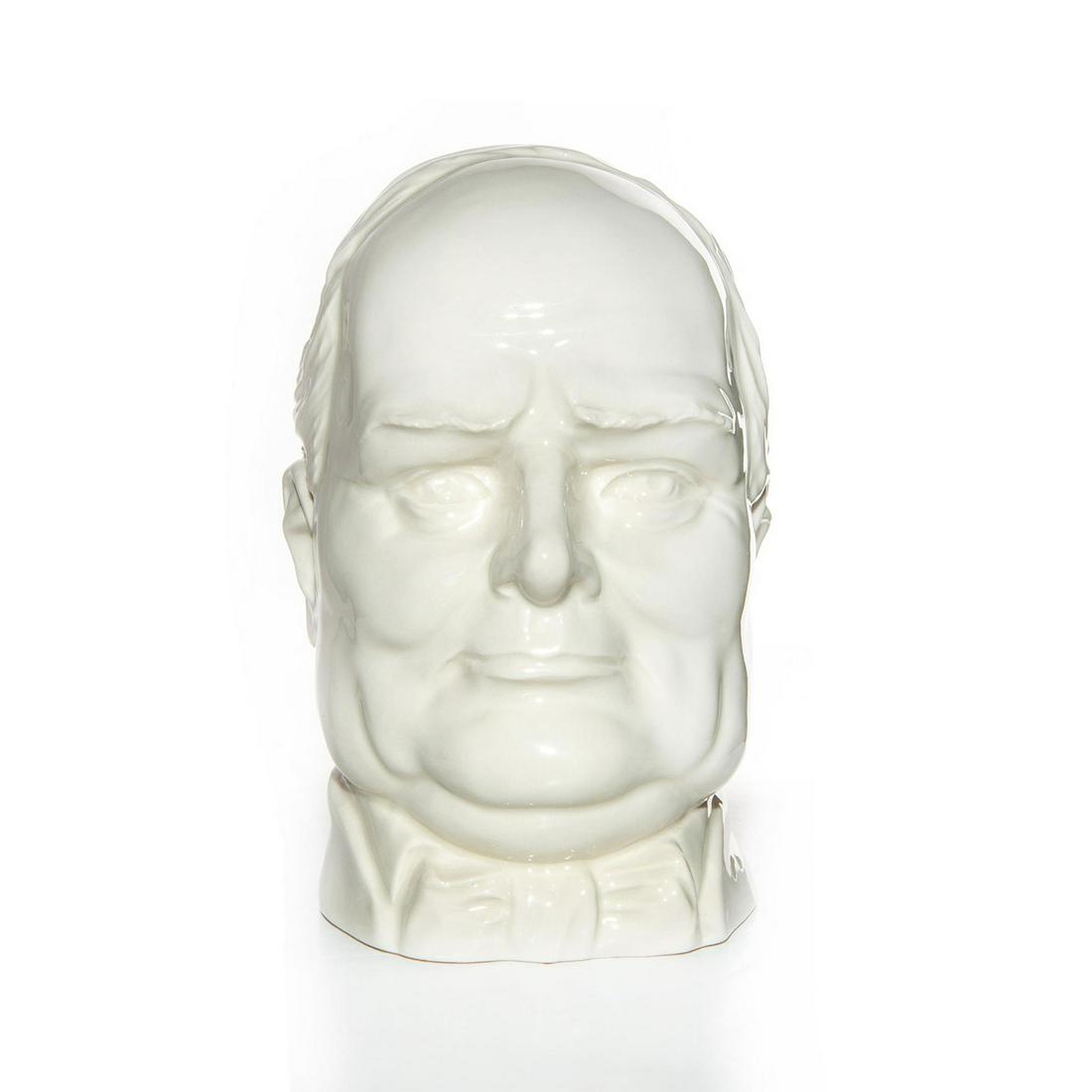 PEGGY DAVIS CHARACTER LOVING CUP, WINSTON CHURCHILL: Ltd. Ed. 42 of 250. Hand Made, undecorated jug. Peggy Davis backstamp. Artist: Andy Moss Issued: 20th c. Dimensions: 7.5"H Edition Number: 42 Edition Size: 250 Manufacturer: Peggy Davis Country of Ori