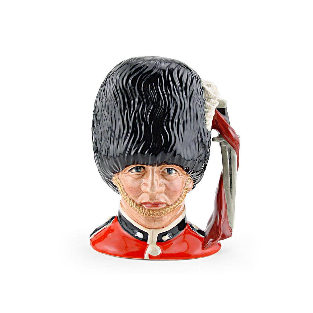GUARDSMAN D6755 - LARGE - ROYAL DOULTON CHARACTER JUG: Guardsman D6755 (red tunic, black bearskin hat). Designed by Stanley J. Taylor. Series: The London Collection, issued 1986 - 1999. Size: 8"H (Large)Long a fixture in London, the guardsman is easily id
