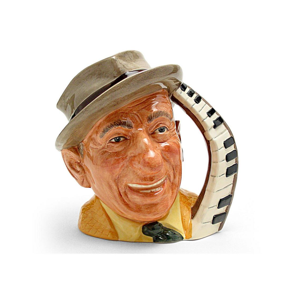 JIMMY DURANTE D6708 - LARGE - ROYAL DOULTON CHARACTER: Royal Doulton Character Jug, Jimmy Durante D6708 (grey and black cap, yellow jacket, cream shirt). Designed by David B. Biggs. Series: The Celebrity Collection, issued 1985 - 1988. Size: 7.5"H (Large)