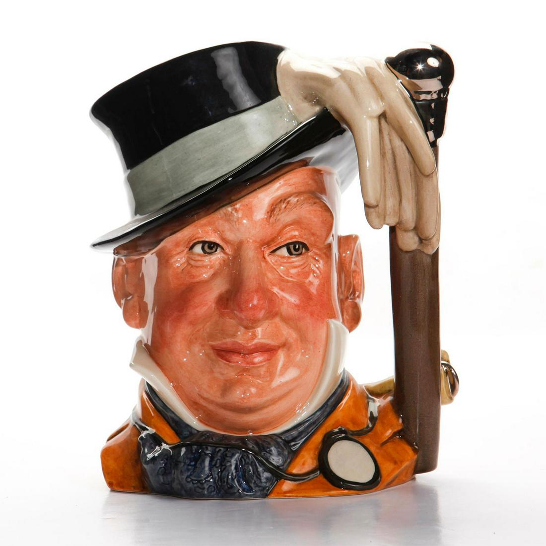 MR. MICAWBER NEW D7040 - LARGE - ROYAL DOULTON: Royal Doulton Character Jug, Mr. Micawber New D7040 (mustard jacket, blue cravat, white shirt points, black hat with grey band). Designed by David B. Biggs. Series: Charles Dickens' Characters, issued