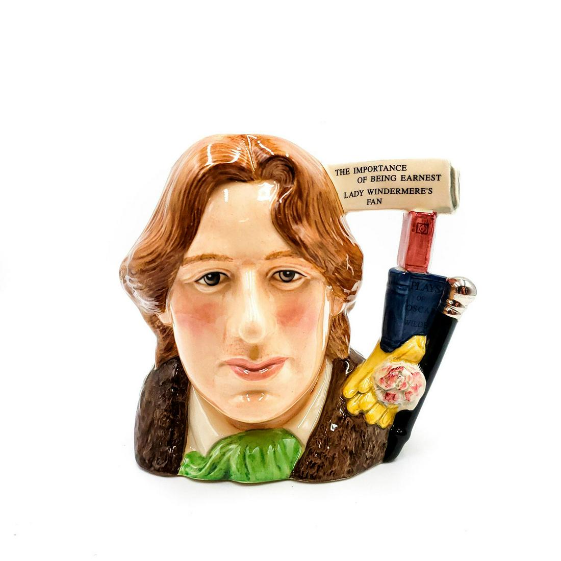 OSCAR WILDE D7146 - LARGE - ROYAL DOULTON CHARACTER JUG: Character Jug of the Year 2000. Brown, tan and green colorway. Commemorates the 100th anniversary of Wilde's death. Complete with Certificate of Authenticity. Artist: David B. Biggs Issued: 2000 Dimen