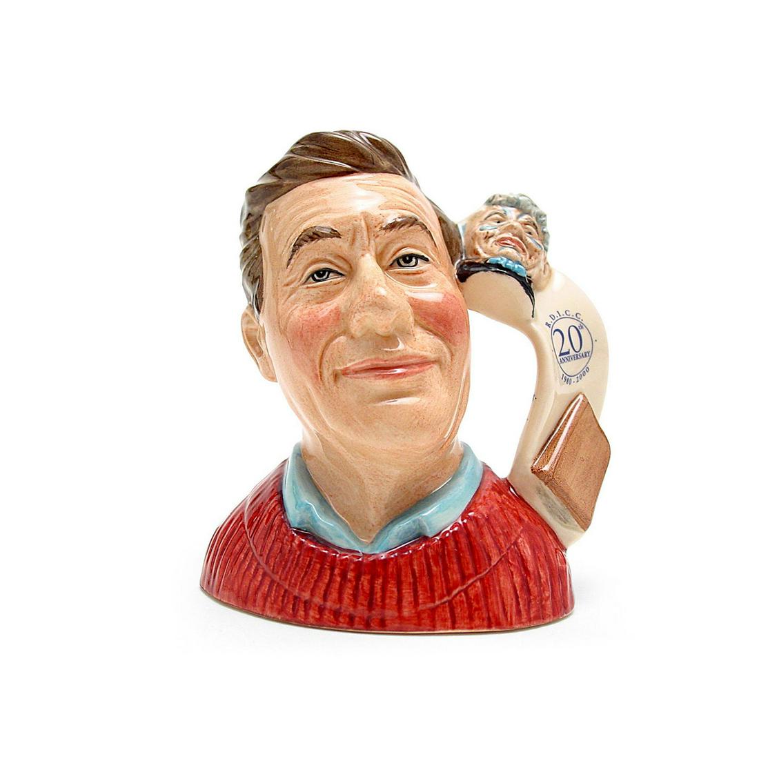 JUG COLLECTOR D7147 - SMALL - ROYAL DOULTON CHARACTER: Royal Doulton Character Jug, Jug Collector D7147 (white shirt; rose sweater). Designed by Robert Tabbenor. Series: RDICC, issued 2000- 2000. Size: 4.75"H (small) Manufacturer: Royal Doulton Country of