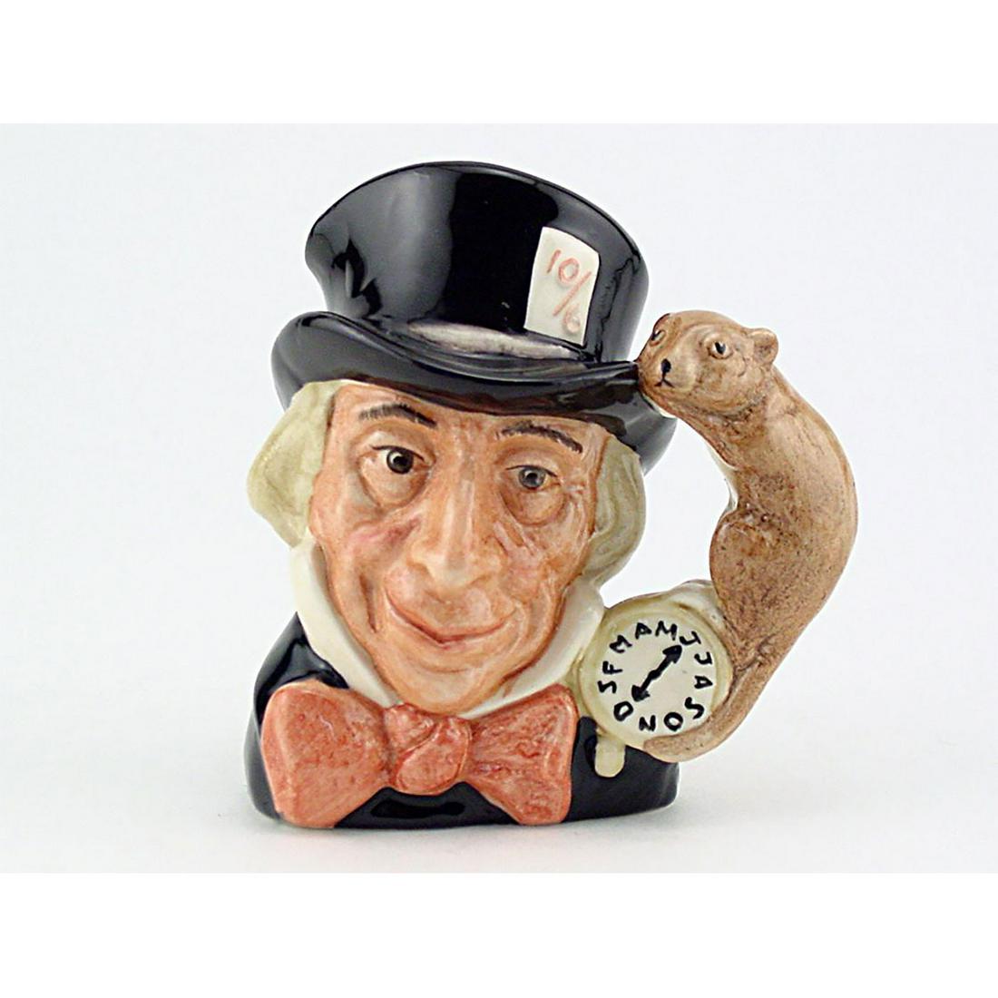 MAD HATTER D6602 - SMALL - ROYAL DOULTON CHARACTER JUG: Mad Hatter D6602 (black hat; dark red bow tie). Designed by Max Henk. Series: Alice in Wonderland, issued 1965 - 1983. Size: 3.75"H (small) A character from Lewis Carroll's "Alice's Adventures in Wond
