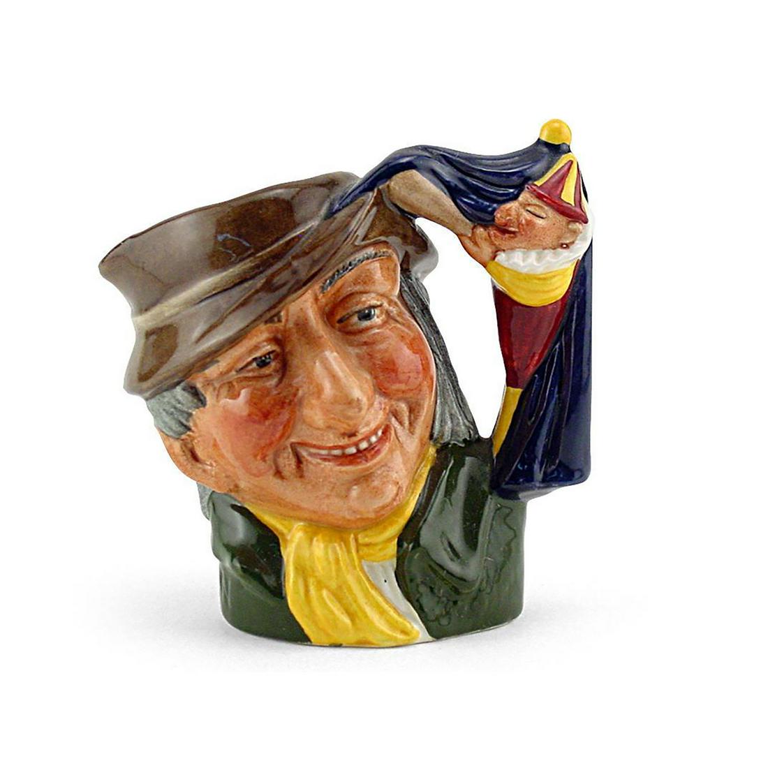 PUNCH AND JUDY MAN D6593 - SMALL - ROYAL DOULTON: Punch and Judy Man D6593 (brown hat; green coat; yellow scarf). Designed by David B. Biggs, issued 1964 - 1969. Size: 3.5"H (Small) Coming to England in the 17th century by way of Italy and France, th
