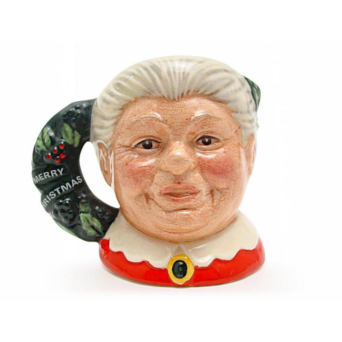 MRS. CLAUS D6922 - MINI - ROYAL DOULTON CHARACTER JUG: Red, cream and green coloration. Royal Doulton Character Jug, Mrs. Claus D6922 Designed by Stanley J. Taylor. Series: Christmas Miniatures, issued 1992 in special edition. Size: 2.5"H (mini).Commissio