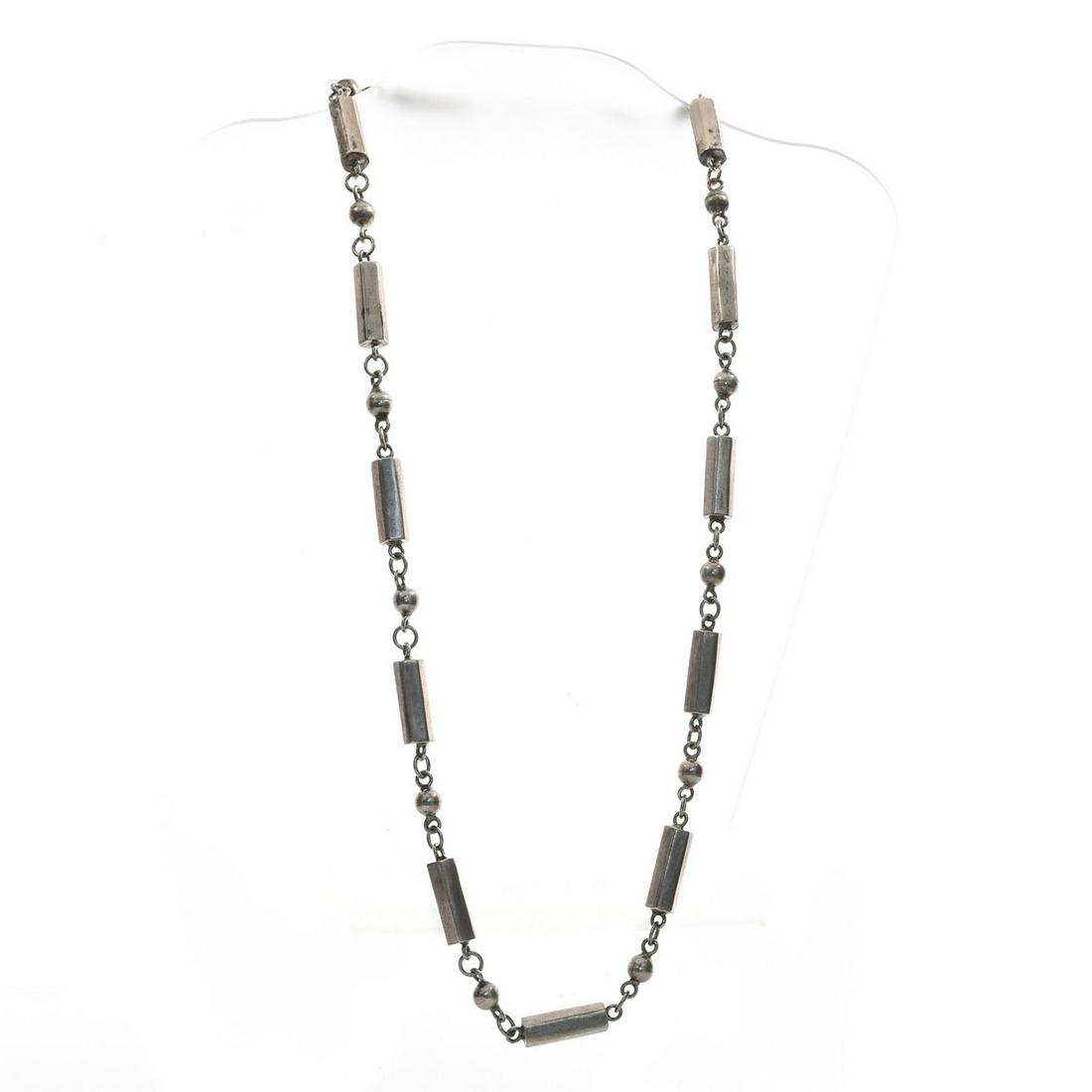 VINTAGE STERLING SILVER CLASP NECKLACE, ORBS & HEXAGONS: Geometric shaped sections. Hallmarked. Approx. weight 96.5 grams. Issued: c. 1970 Dimensions: 30"L Country of Origin: Mexico Provenance: David Farin Collection