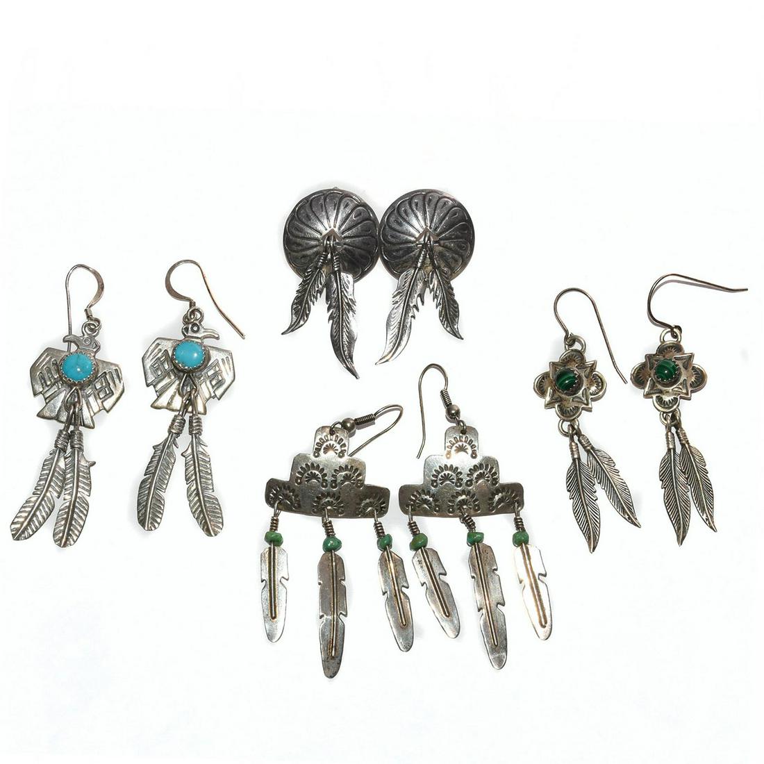4 PAIRS, NATIVE AMERICAN STYLE STERLING SILVER EARRINGS: Turquoise and malachite stones, feather designs. Total weight is approximately 32.4g. Issued: 20th c. Dimensions: 2.25"H, largest Provenance: David Farin Collection