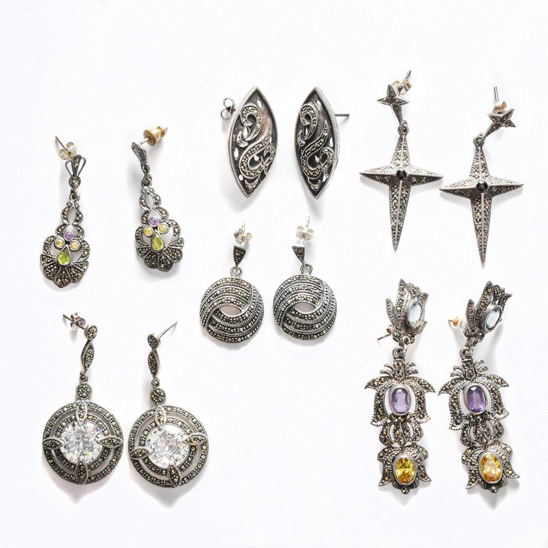 6 PAIRS, STERLING SILVER EARRINGS: Inset with marcasite, colored stones. 5/6 stamped 925. Total weight is approximately 55g. Some patina to silver. Issued: 20th c. Dimensions: 2.5"H, largest Provenance: David Farin Collection