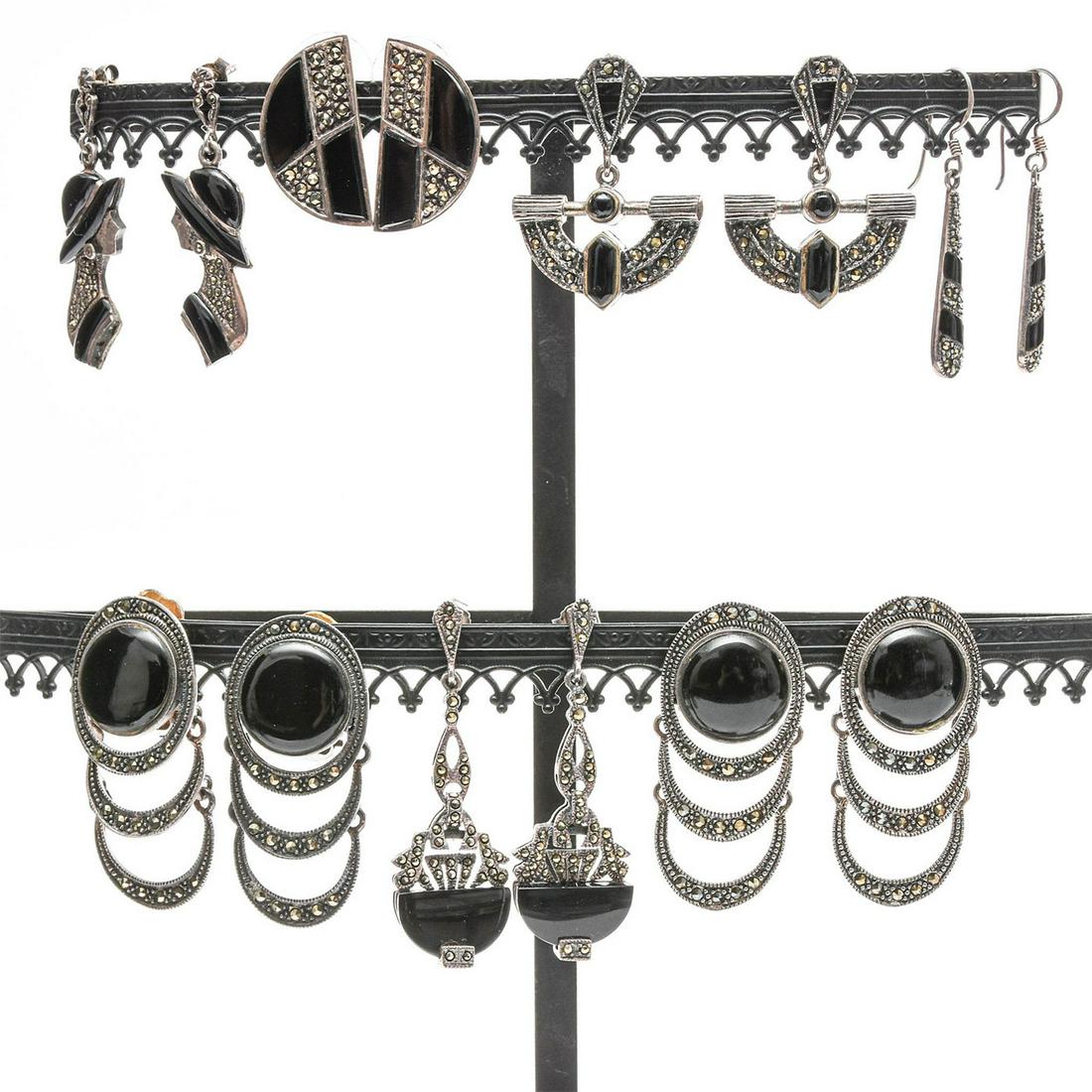 7 PAIRS, ART DECO STERLING SILVER EARRINGS W. MARCASITE: Each w. inset black stone. Total weight is approximately 71.7g. Issued: 20th c. Dimensions: 2"H, largest Provenance: David Farin Collection
