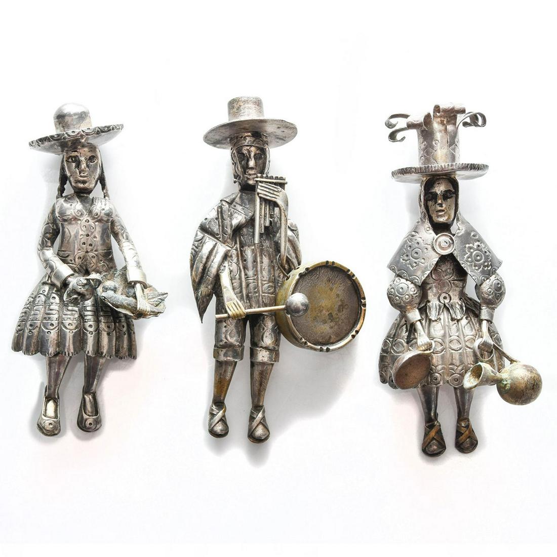 GROUP OF 3 VINTAGE 800 SILVER FIGURINE BROOCH PINS: Musician, fruit seller and lady tinker. Approx. weight 71.5 grams. Issued: c. 1970 Dimensions: 3.5"L Country of Origin: Mexico Provenance: David Farin Collection