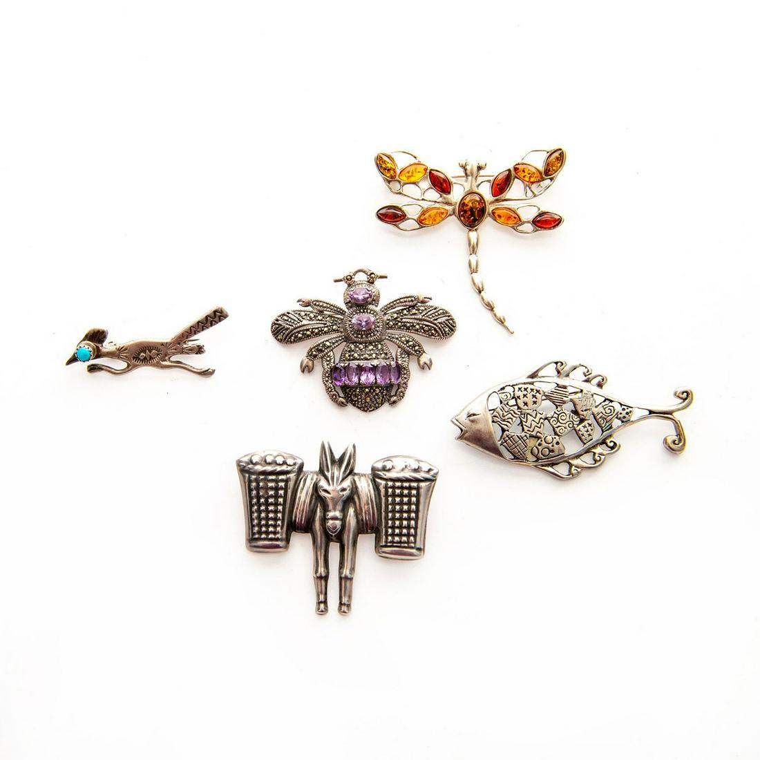 GROUP OF 5 925 SILVER PENDANT PINS, ANIMAL THEMES: Roadrunner, dragonfly with stones, bee with stones, fish, donkey. Issued: c. 1980 Dimensions: 1.75"H x 2.25"W, largest Provenance: David Farin Collection