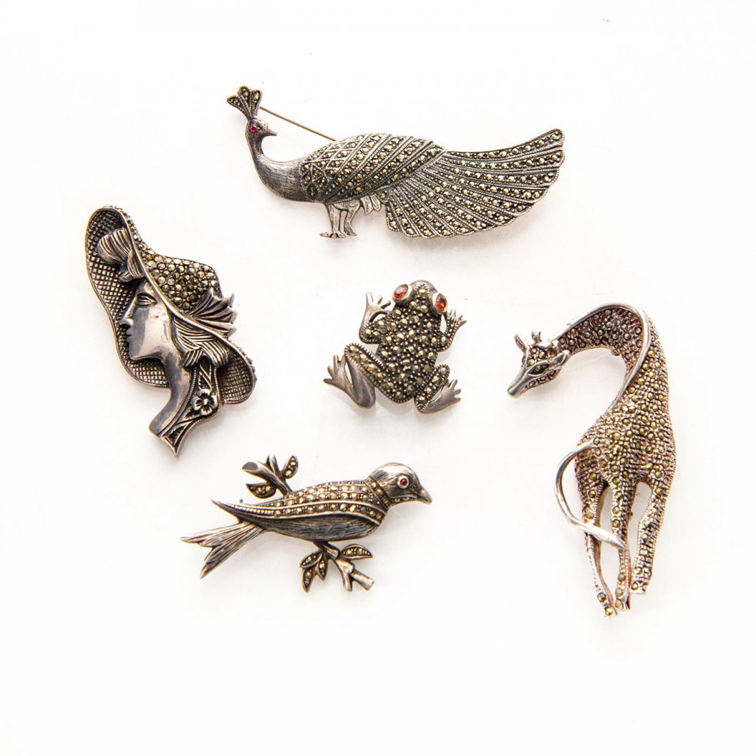 GROUP OF 5 VINTAGE MARCASITE PENDANT BROOCH PINS: Giraffe, peacock, bird, frog, and Art Deco lady in cameo. Issued: c. 1980 Dimensions: 3"L, largest Provenance: David Farin Collection