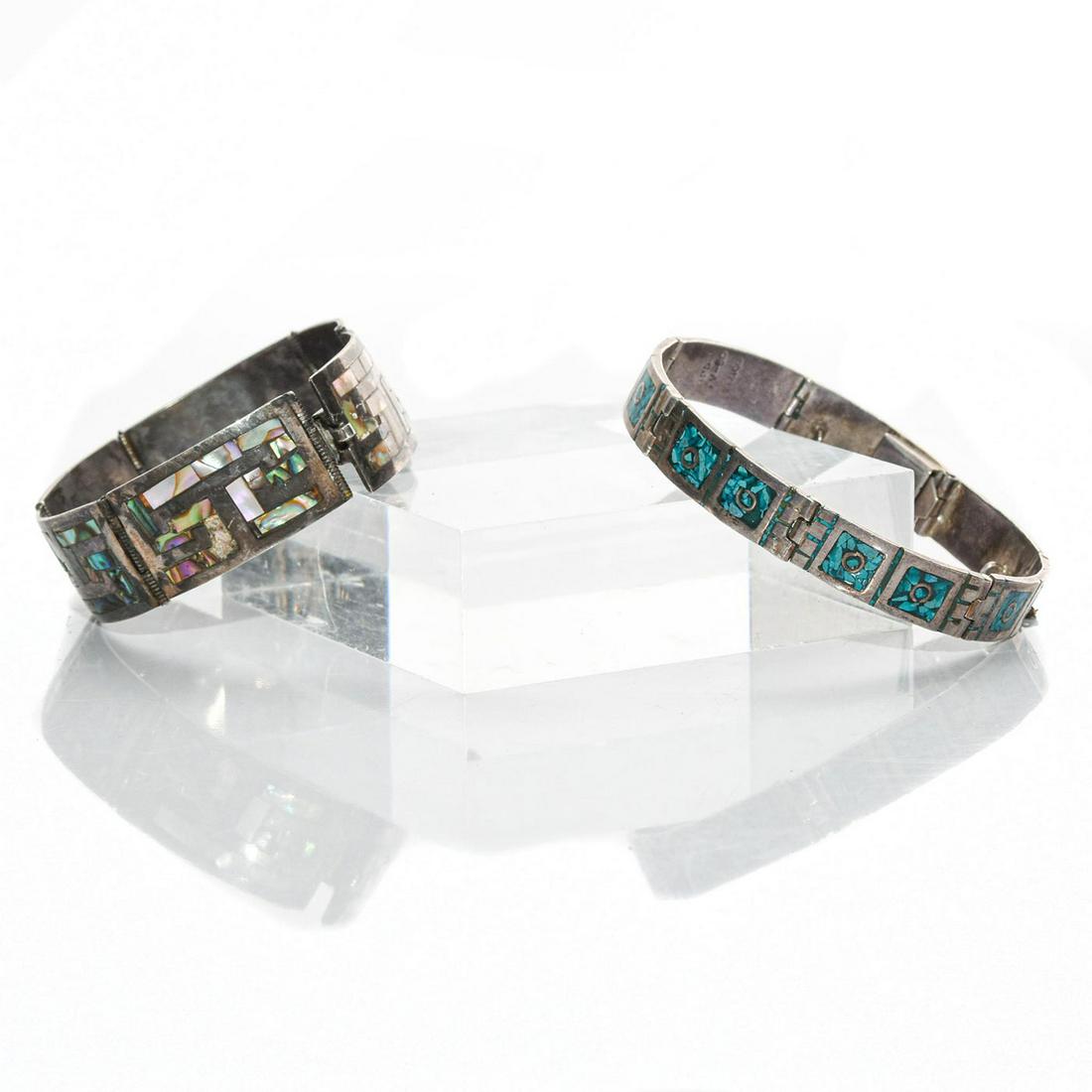 PAIR, MEXICAN STERLING SILVER INLAID LINK BRACELETS: Turquoise, abalone shell inlays. Stamped Sterling, Mexico. Total weight is approximately 59.1g. Missing 1 piece of abalone shell inlay. Issued: 20th c. Dimensions: 8.5"C, each Country of Origin: Mexic