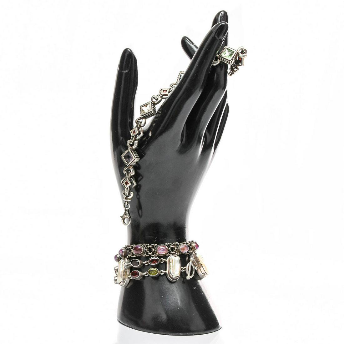 3 STERLING SILVER LINK BRACELETS: Inset w. stones, shell. Each stamped 925. Total weight is approximately 74.1g. Issued: 20th c. Dimensions: 7.5"L, longest Provenance: David Farin Collection