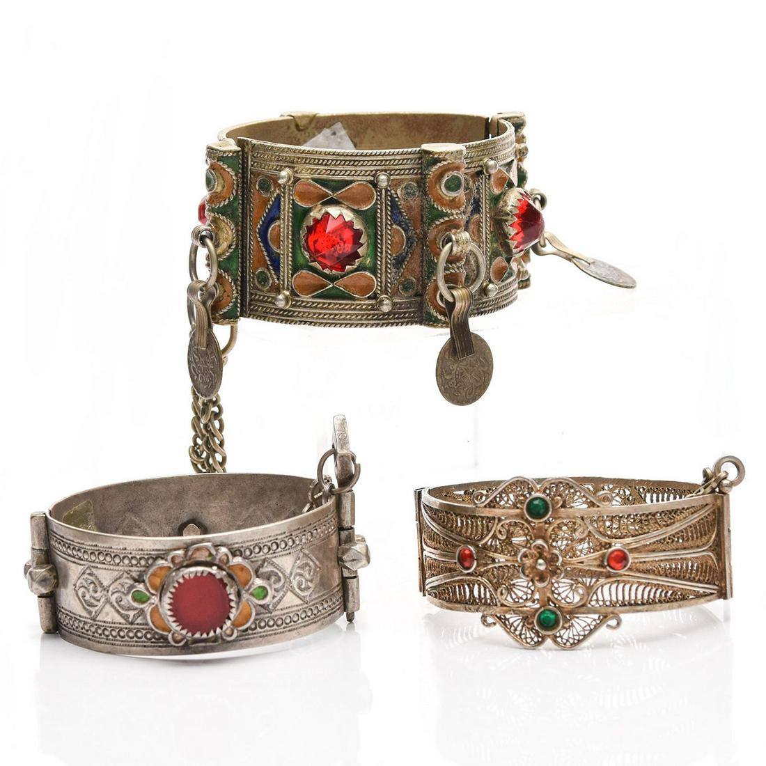 3 VINTAGE TRIBAL CUFF BRACELETS: Wide frame with metal wirework and stone insets; pin closure. Size, 6.5"C, each. Total approx. weight 197g. Issued: 20th c. Dimensions: 1.5"H x 2.5"W, largest Provenance: David Farin Collection