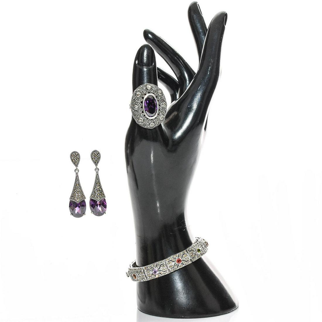 MARKED 925 SILVER STAMPED BRACELET EARRING AND RING: Precious stones such as Peridot, Chrysolite and Alexandrite. Total weight 56g. Bracelet size 7"C and ring size 9. Issued: 20th c. Dimensions: 56g. Provenance: David Farin Collection