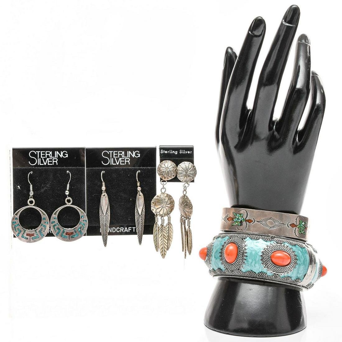 NATIVE AMERICAN STYLED BRACELETS AND EARRING SET: With natural coral stones and feathered earrings. Total weight 155g. Bracelet sizes 6" and 7"C. Issued: 20th c. Dimensions: 155g. Provenance: David Farin Collection