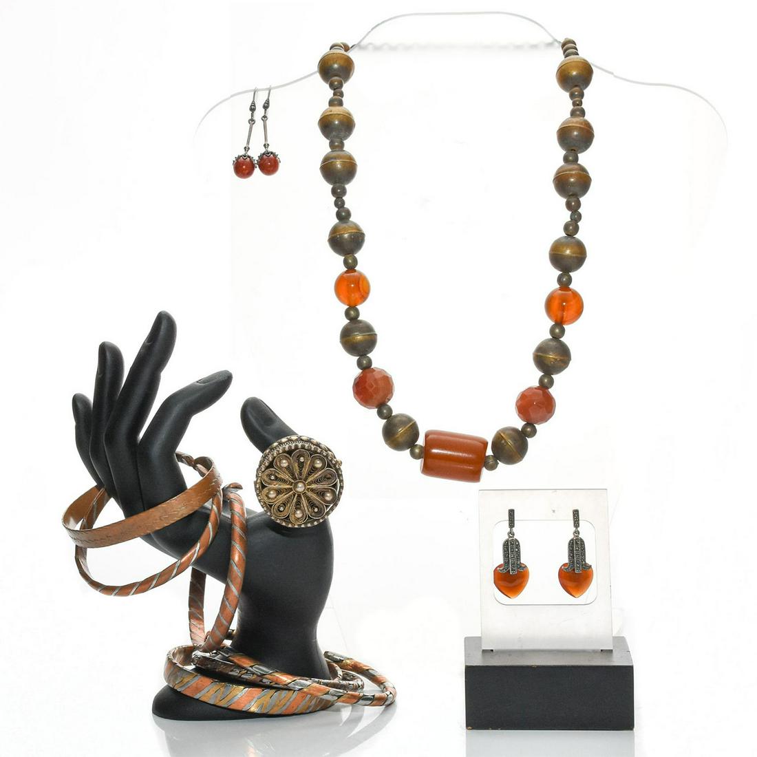 RARE MIDDLE EASTERN AMBER STYLED JEWELRY SET.: Necklace, 6 bracelet, 2 earrings, and a ring. Total weight 237g. Necklace size 19"C, Bracelet size 8"C, ring size 7. Issued: 20th C. Dimensions: 19"C Provenance: David Farin Collection