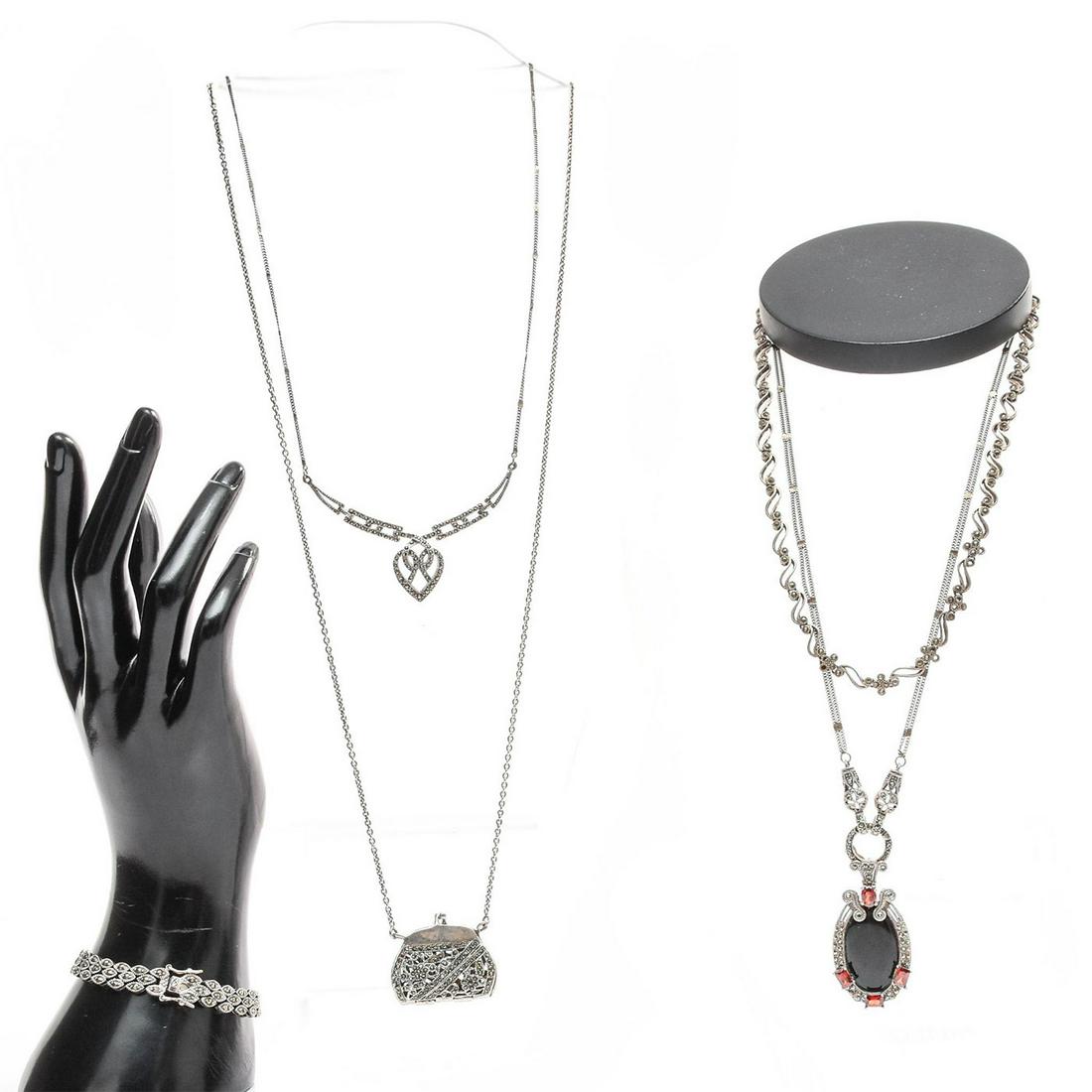 4 STERLING SILVER AND MARCASITE NECKLACES, 1 BRACELET: Each stamped 925. Total weight is approximately 98g. Issued: 20th c. Dimensions: 30"L, longest Provenance: David Farin Collection