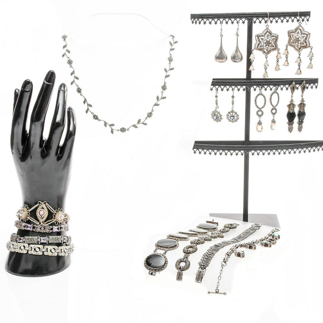 14 PIECES STERLING SILVER JEWELRY SET: Each is missing one or more inset stone. Total weight is approximately 244.3g. 8 bracelets, 1 necklace, 5 pairs of earrings Issued: 20th c. Dimensions: 16.5"L, necklace Provenance: David Farin Collect
