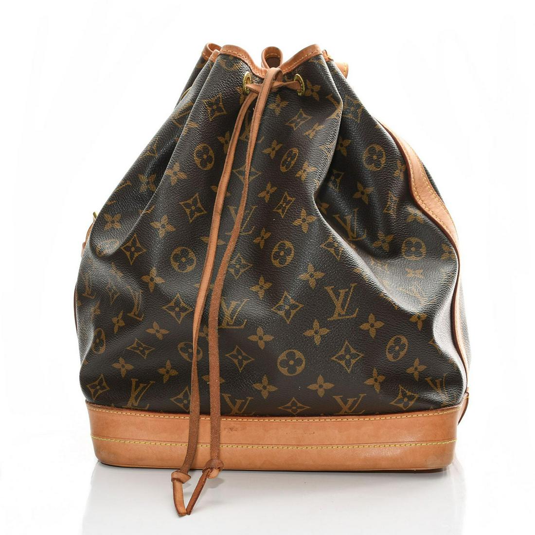 LOUIS VUITTON NOE MONOGRAMMED LEATHER BUCKET BAG: Iconic Louis Vuitton shoulder bag with suede drawstring closure. Louis Vuitton Noe Bucket Shoulder Bag. Brown leather exterior with allover monogrammed LV pattern. Suede drawstring top closure. Adjust