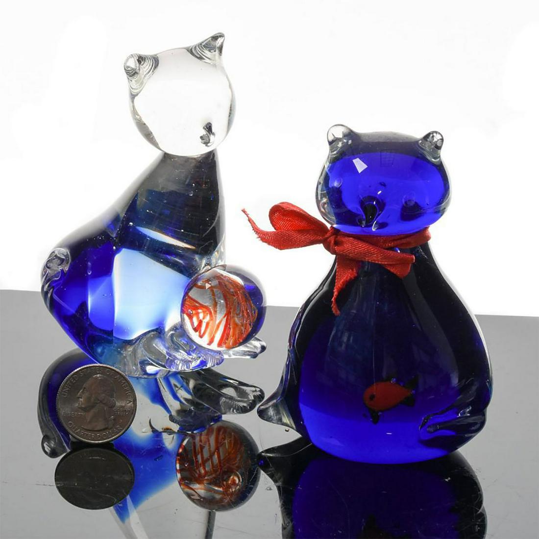 2 MURANO ART GLASS FIGURES, CATS: Cat with ball and blue cat with gold fish in belly. Issued: 20th c. Dimensions: 4.5"H Manufacturer: Murano Country of Origin: Italy