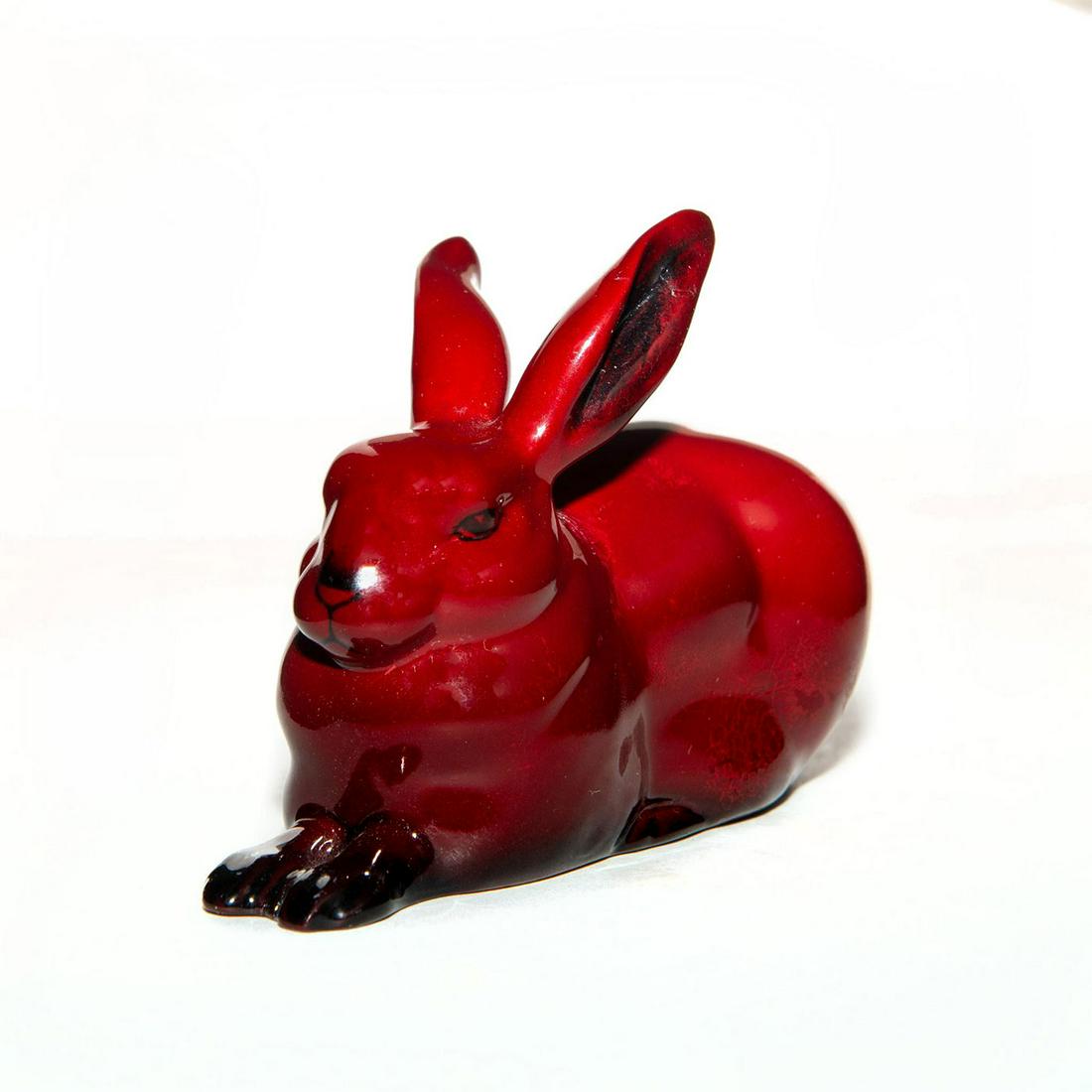 ROYAL DOULTON FLAMBE FIGURINE HARE CROUCHING HN2592: Style 3. Model 1157. Black highlights. Red glaze flaking. Bottom base marked FLAMBE. Royal Doulton backstamp. Issued: 1945-1996 Dimensions: 2.75"H Manufacturer: Royal Doulton Country of Origin: Englan