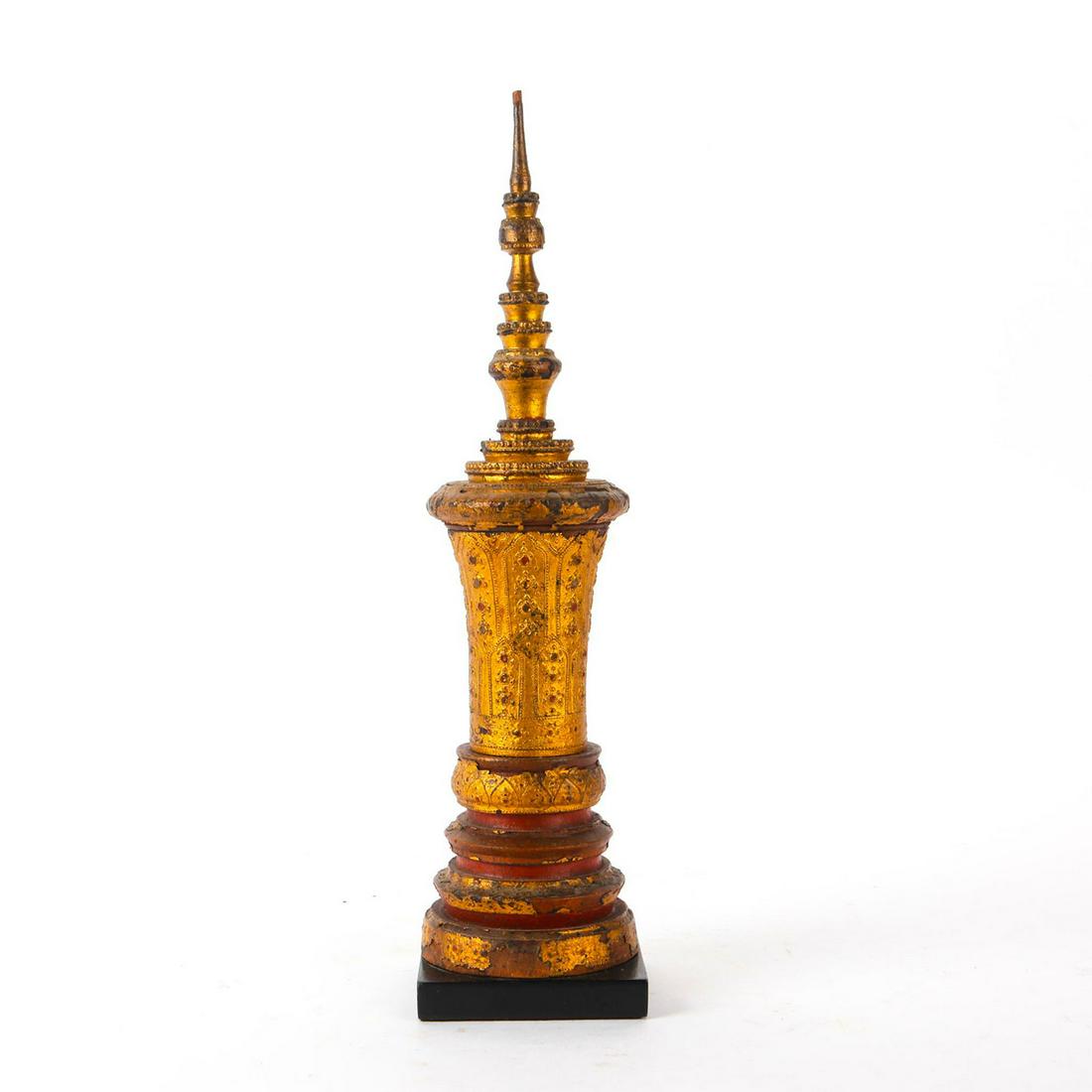 THAI ARCHITECTURAL TEMPLE FINIAL WITH GOLD LEAF: Ayodhya architectural finial, c. 18th century, antique teak wood. Total weight 798g. Issued: 19th c. Dimensions: 18"H Country of Origin: Thailand Provenance: Collection of John J. Lanzendorf